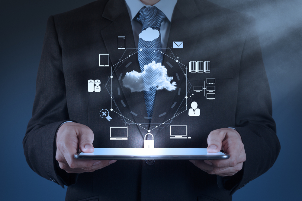 Businessman hand working with a Cloud Computing diagram on the new computer interface as concept