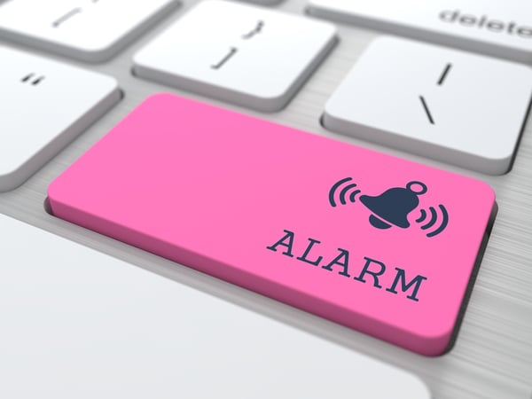 Security Concept - The Red Alarm Button on Modern Computer Keyboard. 3D Render.