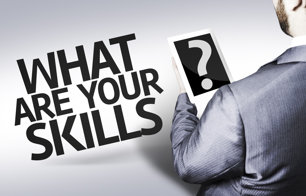 Business man with the text What are your Skills? in a concept image