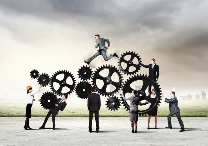 Conceptual image of businessteam working cohesively. Interaction and unity.jpeg