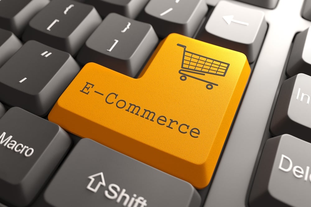 Orange E-Commerce Button on Computer Keyboard. Internet Concept..jpeg